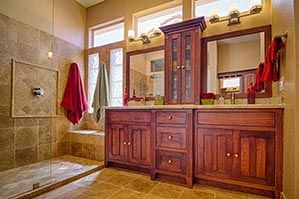 Red Wood Cabinets for a bathroom. 